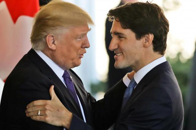 Canadian Prime Minister Justin Trudeau is greeted by U.S. President Donald Trump prior to holdiing talks at the White House in Washington