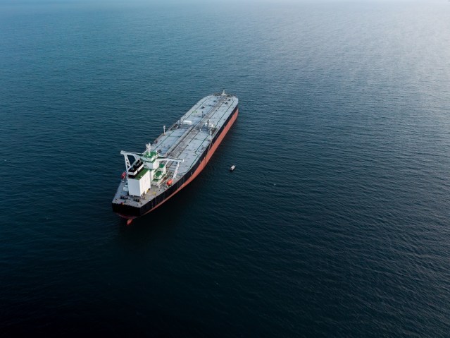Aerial view of a large crude oil tanker ship on the Strait of Hormuz.