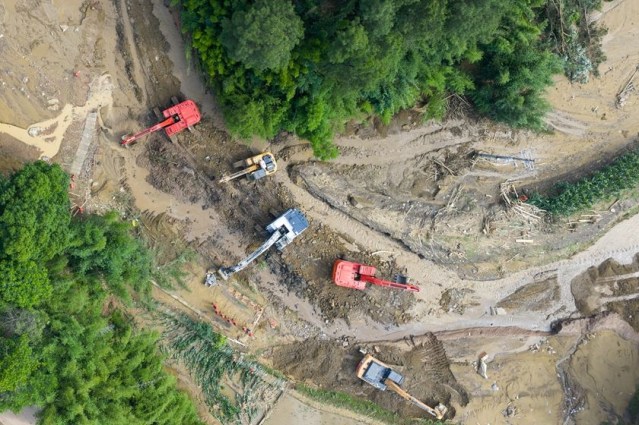 Rescuers conduct search and rescue operations in Daqiao village, Yongchuan district, Chongqing, on May 2026.